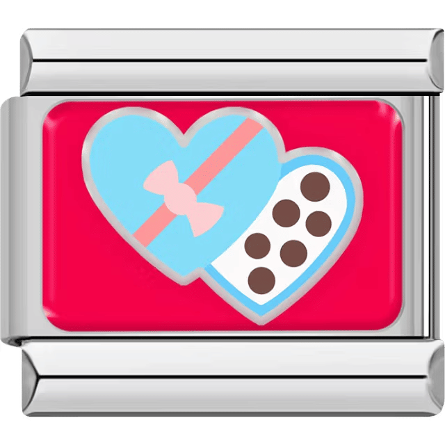 Heart-shaped box of chocolates with a light blue lid and pink bow on a bright red background